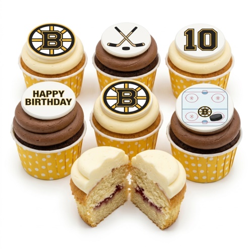 Ice hockey themed cupcakes with Boston Bruins logo, hockey sticks, puck, and custom age topper.