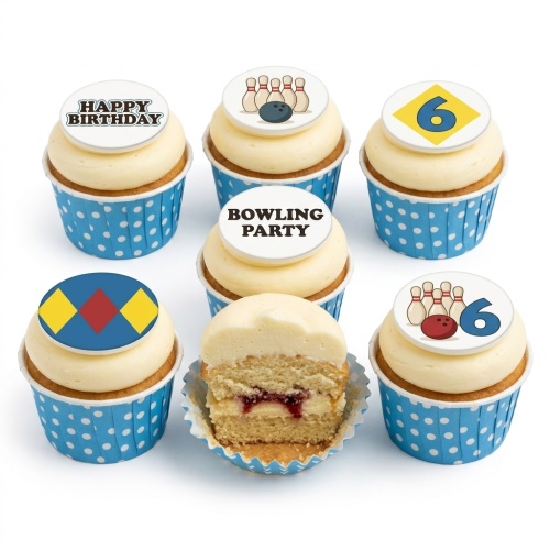 Bowling themed cupcakes with white frosting, blue polka dot wrappers, and custom age/message toppers.