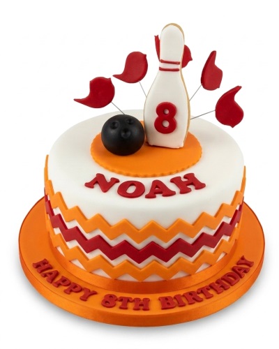 Round white cake with bowling pin and ball topper, red and orange chevron pattern, custom age.