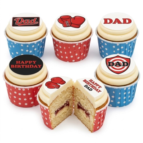 Six cupcakes with white frosting, red boxing gloves, and "Dad" and "Happy Birthday" edible toppers in red and blue polka dot wrappers.
