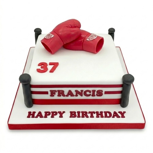 Square white birthday cake designed as a boxing ring with red boxing gloves, custom age '37', and personalised name 'Francis'.