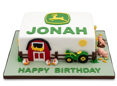 White square cake with green John Deere logo, green tractor, red barn, fence, chickens, pigs, and 'Happy Birthday' message.