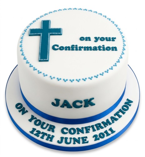White round confirmation cake with a blue cross, blue dot border, and blue ribbon. Features example text 'on your Confirmation' and a personalised name and date.