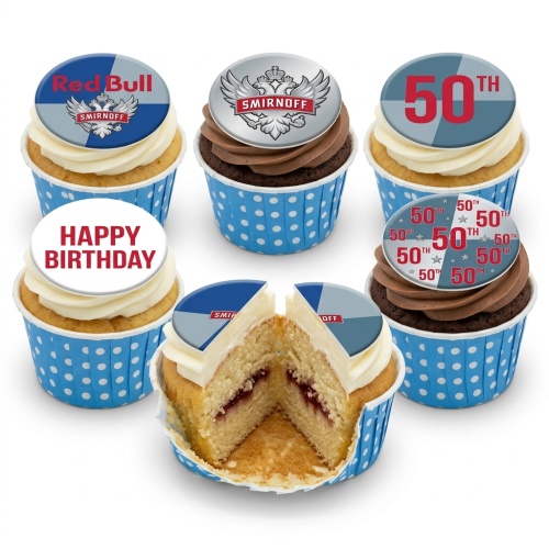 Selection of adult birthday cupcakes with branded and custom age toppers in blue polka dot cases.