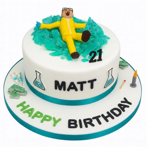 White round cake with a man in a yellow hazmat suit, blue crystals, and lab beakers.