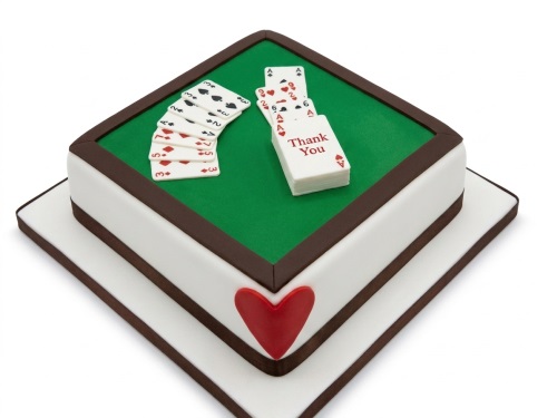 Square card game themed birthday cake with edible playing cards and a custom message.