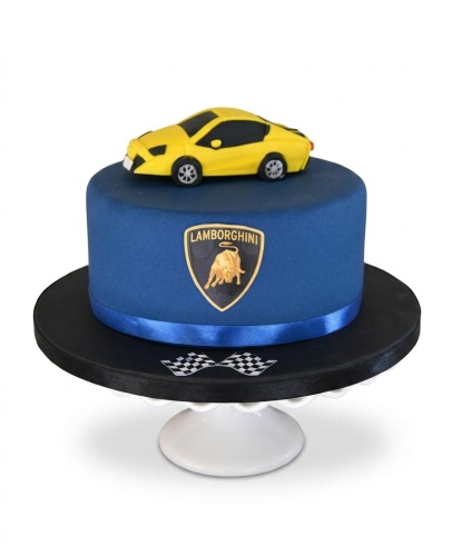 Blue birthday cake with yellow Lamborghini sports car and logo