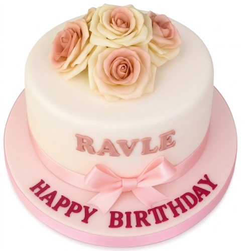 Round white birthday cake with pink and cream sugar roses, pink ribbon, and custom message.