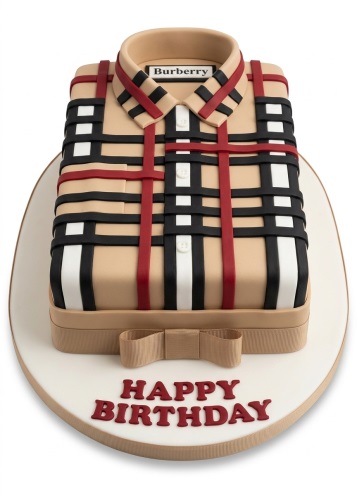 Square birthday cake decorated as a beige, black, white, and red plaid shirt with a collar, buttons, and a bow tie, with "Happy Birthday" written in red on the board.