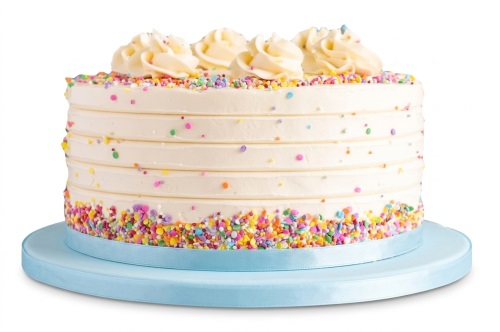 Round birthday cake with white frosting, colourful sprinkles, and cream swirls on a blue cake board.