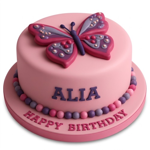 Pink round birthday cake with a large purple butterfly topper and edible beads.