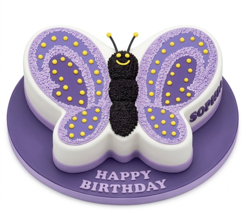White and purple butterfly-shaped birthday cake with yellow polka dots and a smiling black butterfly body.