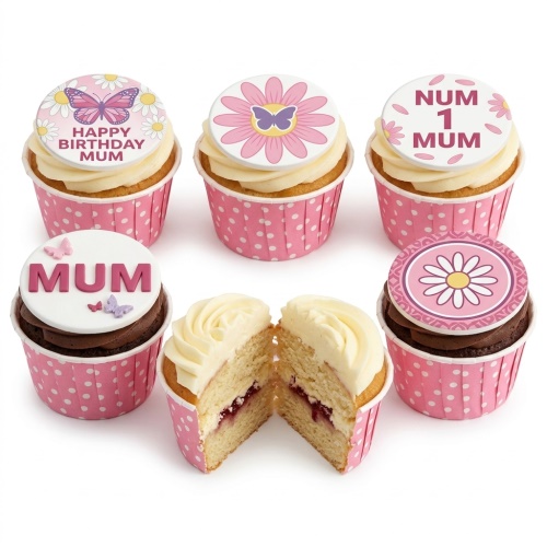 Set of floral and butterfly themed cupcakes with pink polka dot wrappers, some with white frosting, some chocolate.