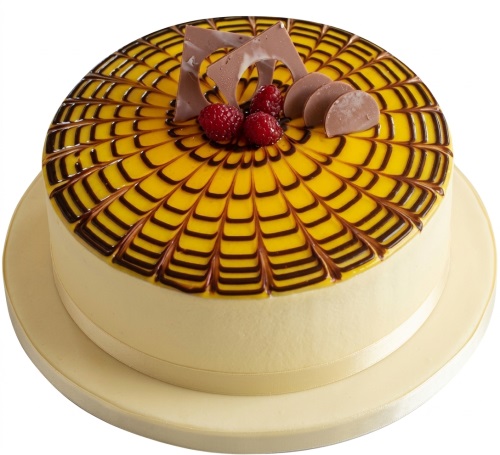 Round elegant birthday cake with yellow and chocolate spiderweb pattern, topped with fresh raspberries and chocolate decorations.