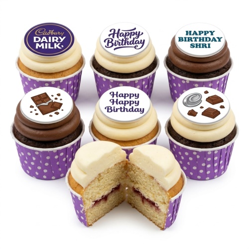 Cadbury Dairy Milk themed birthday cupcakes with chocolate and vanilla icing, purple polka dot wrappers, and custom message toppers.