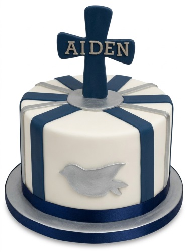 White and navy blue Christening cake with silver cross and dove decorations and custom name.