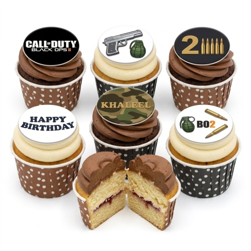 Call of Duty themed cupcakes with game logo, pistol, grenades, and "Happy Birthday" message.