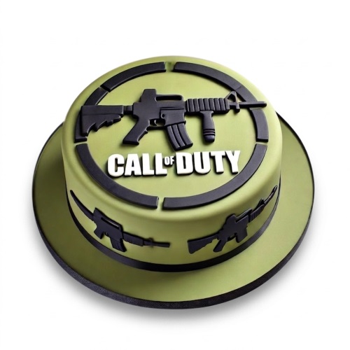 Olive green Call of Duty themed birthday cake with black rifle decorations and logo.