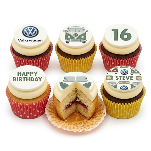 A selection of Volkswagen themed birthday cupcakes with VW logo and camper van toppers, including 'Happy Birthday' message.