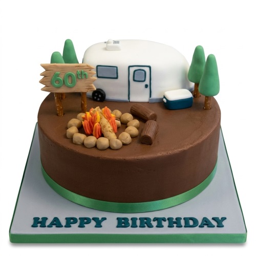 Round brown cake with a white caravan, green trees, campfire, and custom age sign.