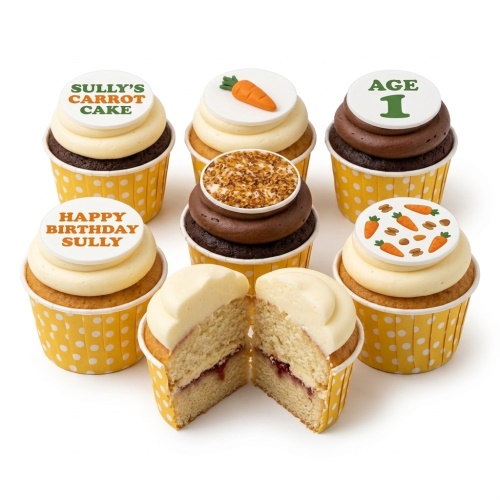 Carrot cake cupcakes with white and chocolate frosting, topped with carrots, nuts, and custom age and name toppers.