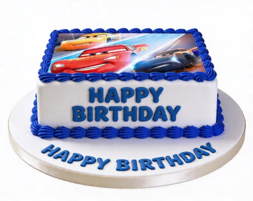 Square white birthday cake with blue icing borders and an edible image of Disney Cars characters, including Lightning McQueen.