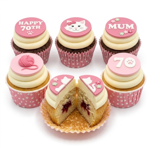Pink and white cat theme birthday cupcakes with custom age and knitting decorations.