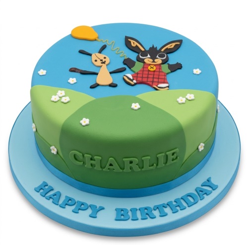 Round blue and green Bing Bunny themed birthday cake with a personalised name and Happy Birthday message.