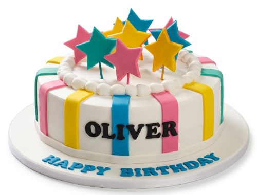 Round white birthday cake with colourful vertical stripes and 3D star toppers.