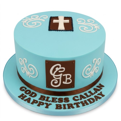 Round blue Christening cake with a white cross, white scrolls, and brown ribbon.
