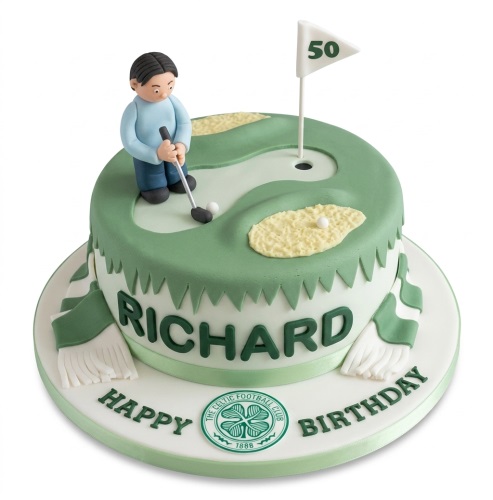Round golf course birthday cake with golfer figurine, flag, and green and white football scarf.