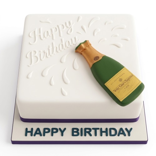 White square birthday cake with a green champagne bottle decoration and 'Happy Birthday' text.