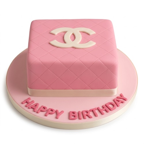 Pink quilted square cake with Chanel logo and "Happy Birthday" message.