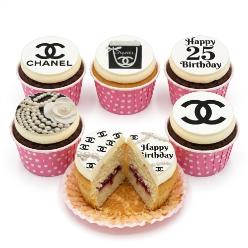 Chanel theme cupcakes with black and white logos, shopping bag, pearls, and white camellia flower decorations.