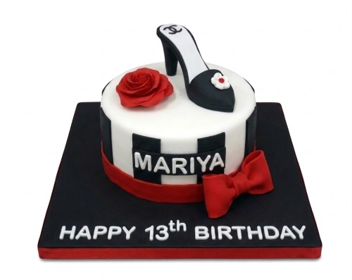 White and black high heel birthday cake with red rose and bow, personalised name and custom age.