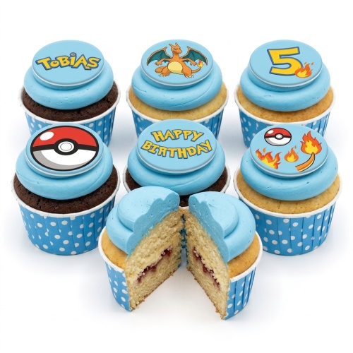 A selection of Pokémon themed cupcakes with light blue frosting and blue polka dot wrappers, featuring Charizard and Poké Ball toppers, with a custom age and a 'Happy Birthday' message.