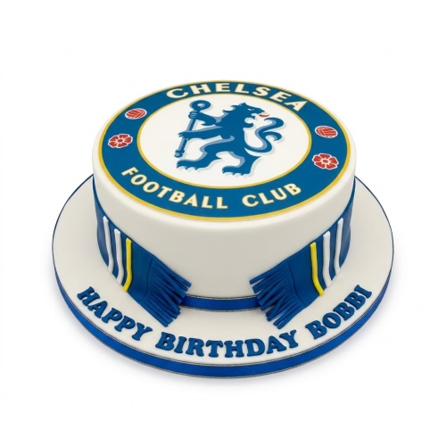 Round white cake with Chelsea Football Club logo on top and blue and yellow scarf design around the side, with a custom message on the board.