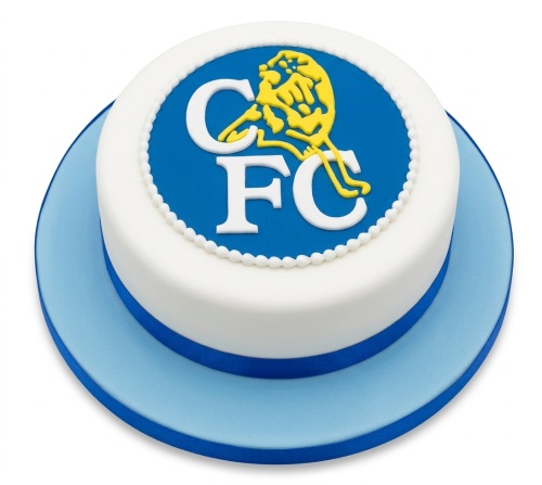 Round white fondant cake with a blue circle featuring the yellow Chelsea FC lion and 'CFC' logo, on a light blue cake board.