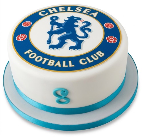 Round white fondant cake with Chelsea Football Club logo on top and a blue custom age '8' on the side, with a blue ribbon around the base.