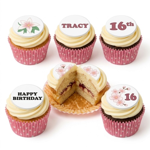 Six cupcakes with white frosting and pink polka dot cases. Toppers feature pink flowers, a name, an age, and "HAPPY BIRTHDAY".