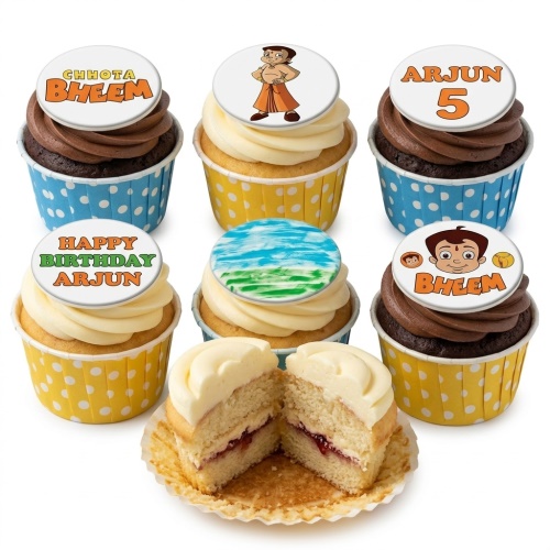 Set of Chhota Bheem themed birthday cupcakes with character toppers, some with personalised messages and a custom age topper, in yellow and blue polka dot cases.