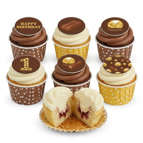 Assortment of chocolate and vanilla cupcakes with chocolate bar, Ferrero Rocher, Happy Birthday, and custom age '1' toppers in polka dot and yellow cases.