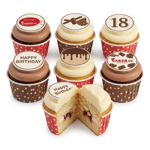 Assorted chocolate and vanilla birthday cupcakes with custom age and 'Happy Birthday' toppers.