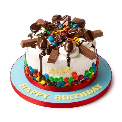 Round white cake topped with M&M's, chocolate bars, and peanut butter cups, with chocolate drizzle. Features a blue board with a red ribbon and a custom message.