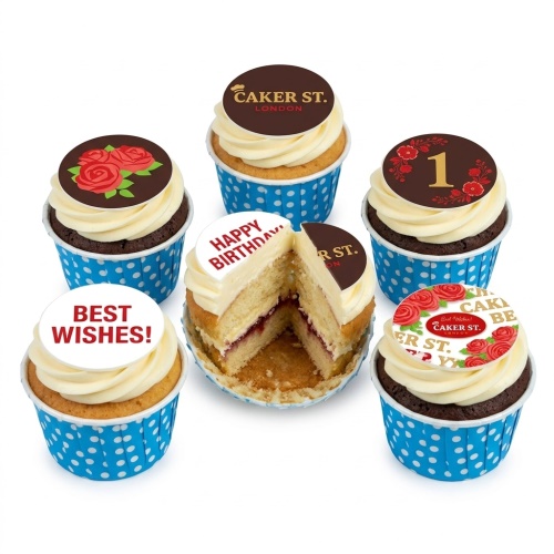 Cupcakes with white frosting, red rose and "Happy Birthday" toppers, in blue polka dot wrappers.