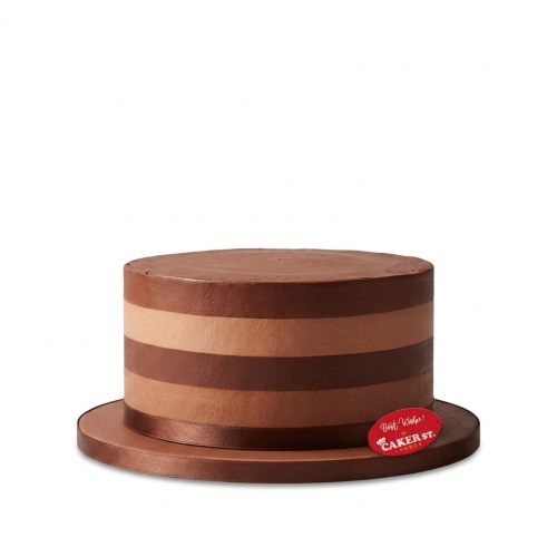 Round chocolate cake with horizontal stripes in varying shades of brown on a brown cake board.