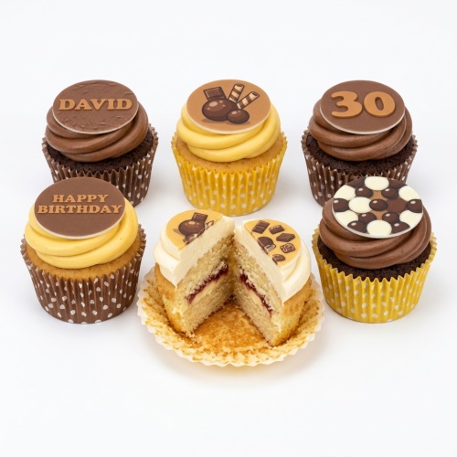 A selection of chocolate and vanilla cupcakes with chocolate frosting and customisable chocolate-themed toppers, including a custom age and message.