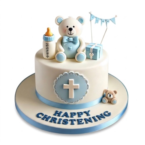 White and blue Christening cake with a teddy bear, baby bottle, gift, and cross decorations.