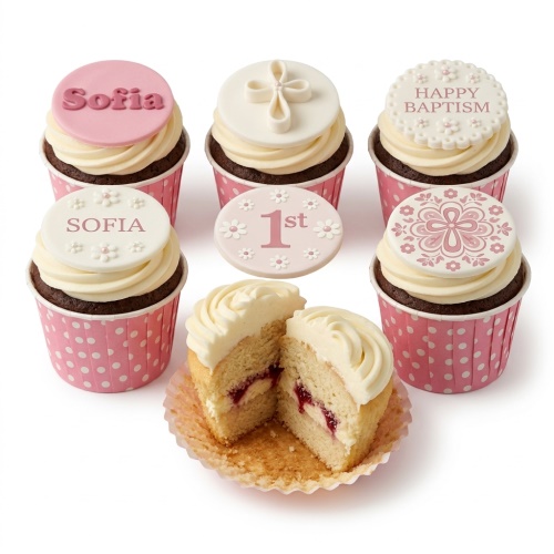 Pink and white Christening cupcakes with cross, floral, and custom name toppers.