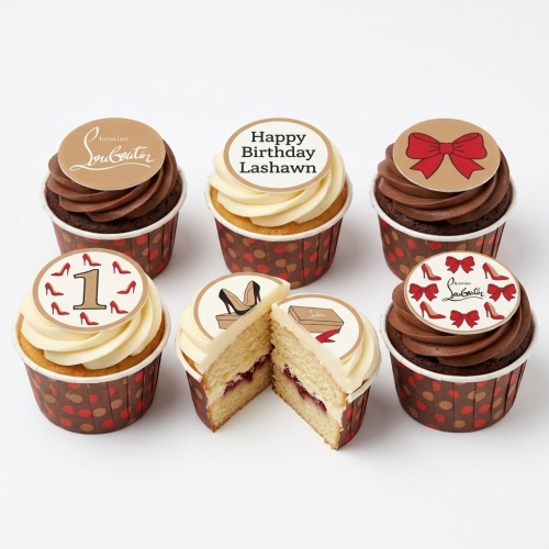 Cupcakes with Louboutin logo, red high heels, red bows, and a custom age topper.